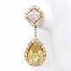 Dazzling Radiant And Pear Earrings (7.12 ct)