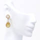 Dazzling Radiant And Pear Earrings (7.12 ct)